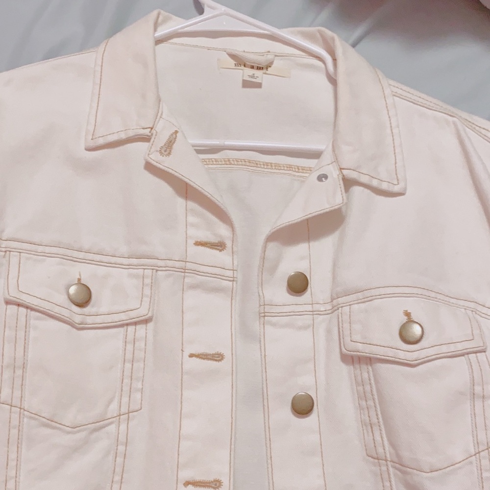 White, slightly cropped jacket